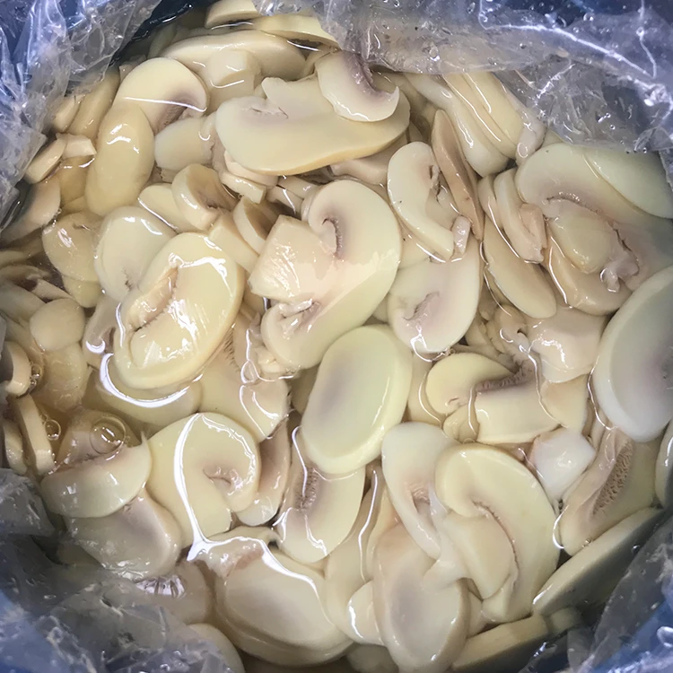 Sliced brined mushroom in drums